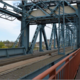 Mennens inspecteert staalkabels van spoorbrug Zutphen